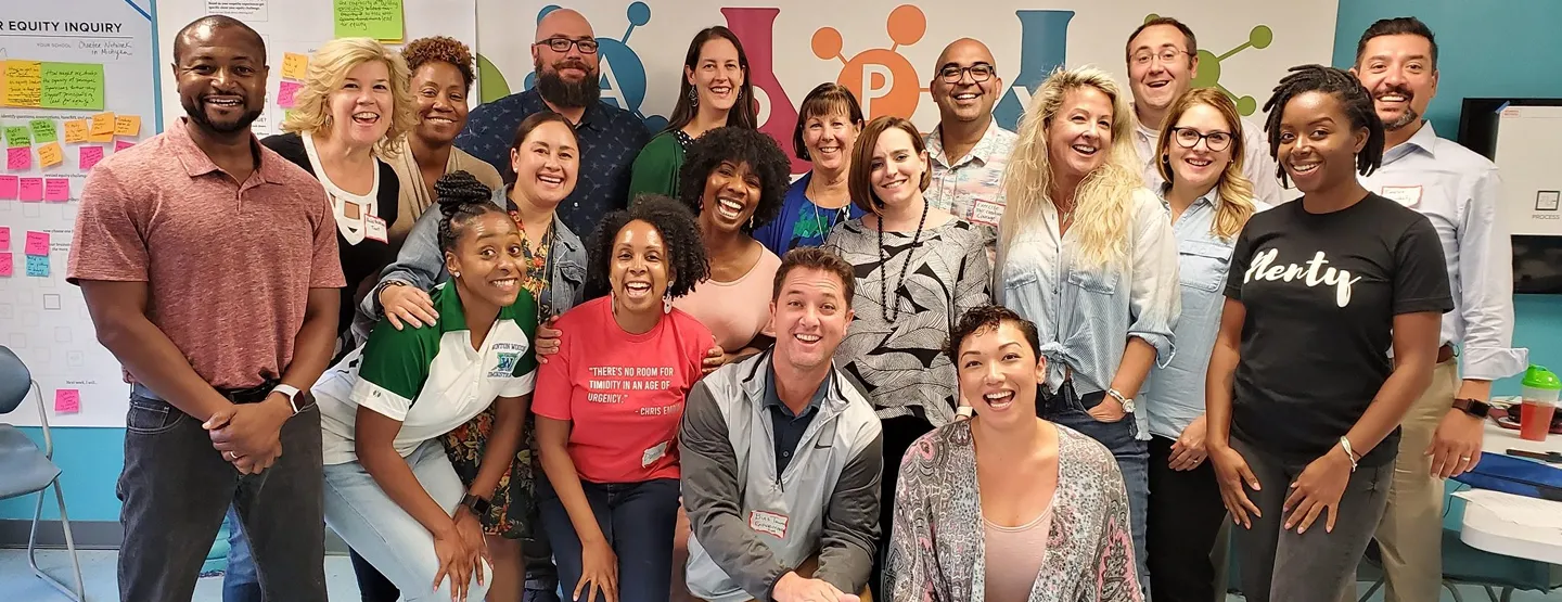 A group of educators in a classroom