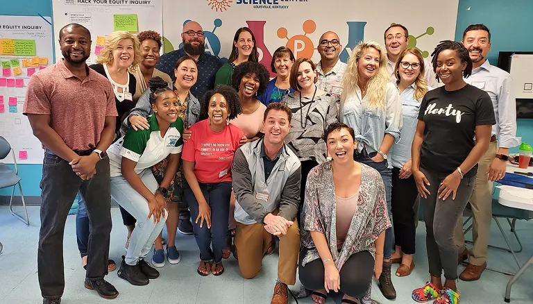 A group of educators in a classroom - for tablet