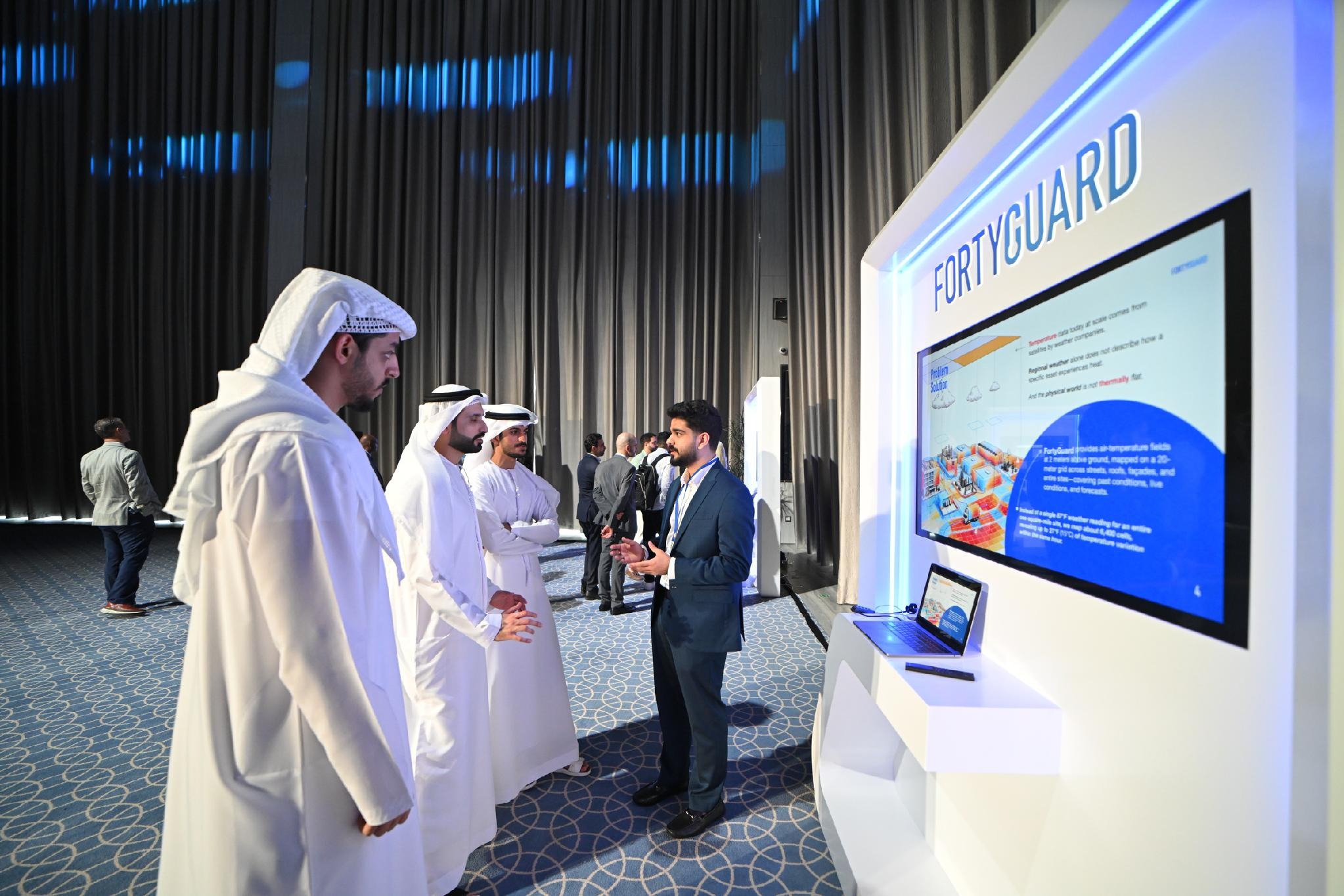 A discussion with visitors at the FortyGuard demonstration stand.