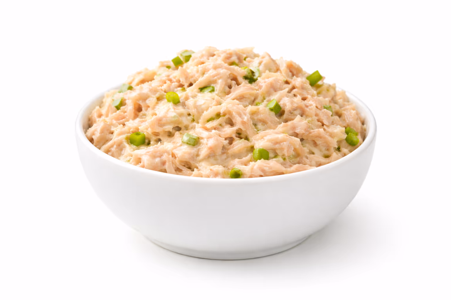 White bowl filled with creamy tuna salad mixed with chopped green onions.