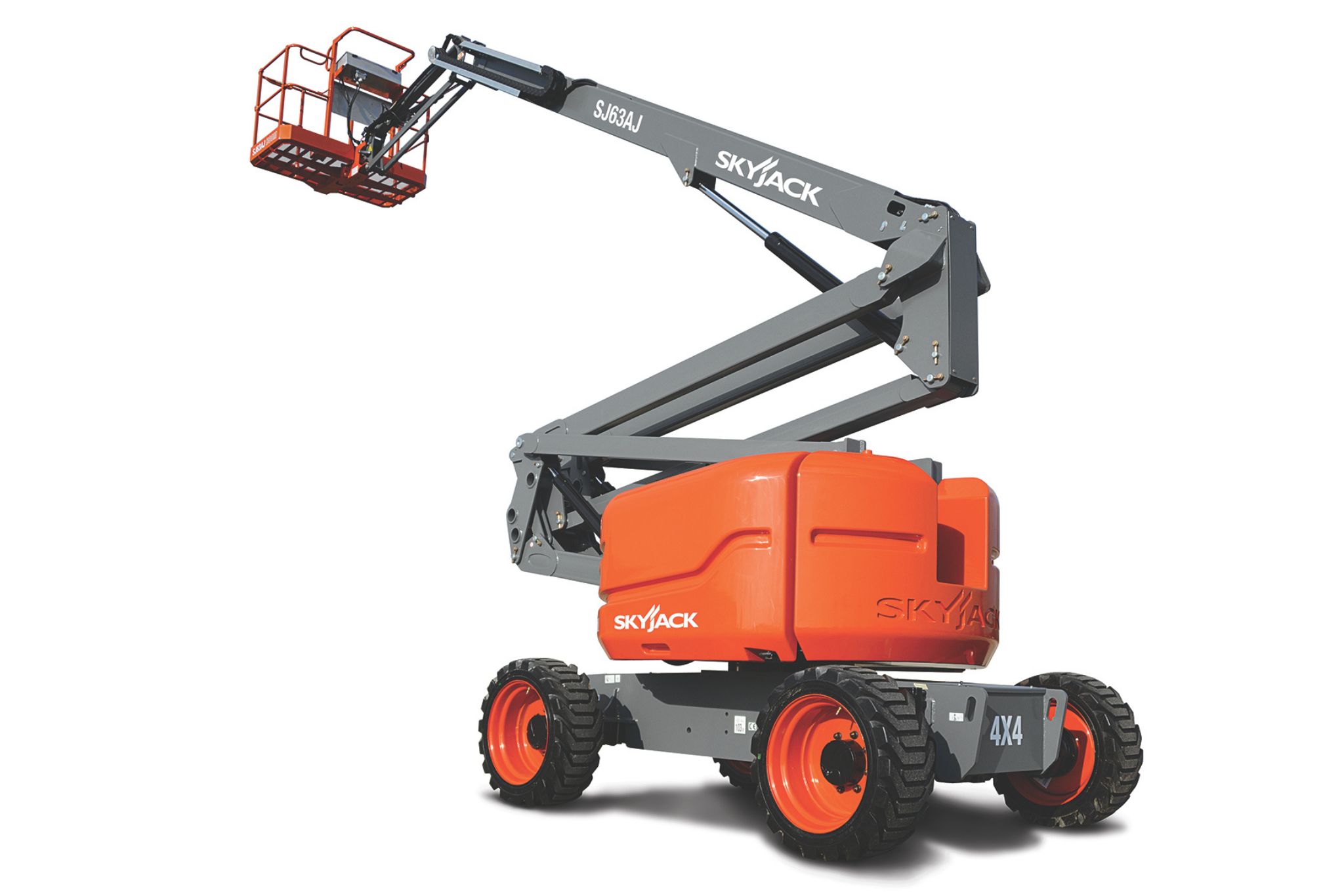 Two construction workers in yellow safety gear, one standing on the ground and one in an orange aerial work platform near a large green industrial structure.