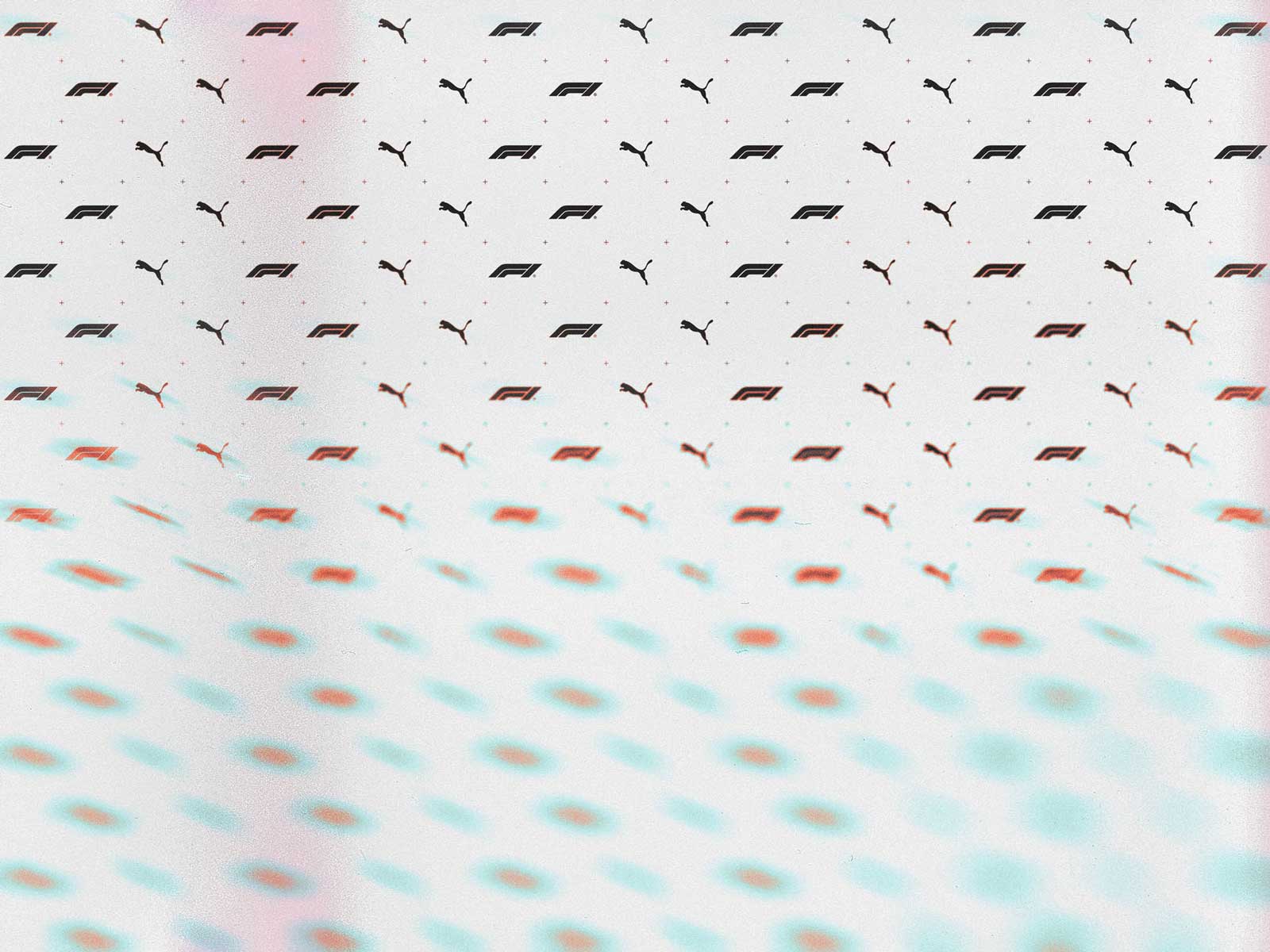 Abstract grey background with repeating black Puma and F1 logos arranged in a grid pattern.