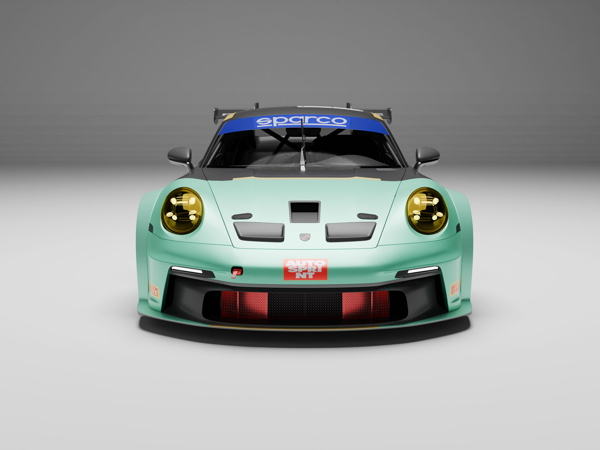 Front view of a mint green Porsche race car with yellow headlights, black grille, and blue Sparco windshield banner.