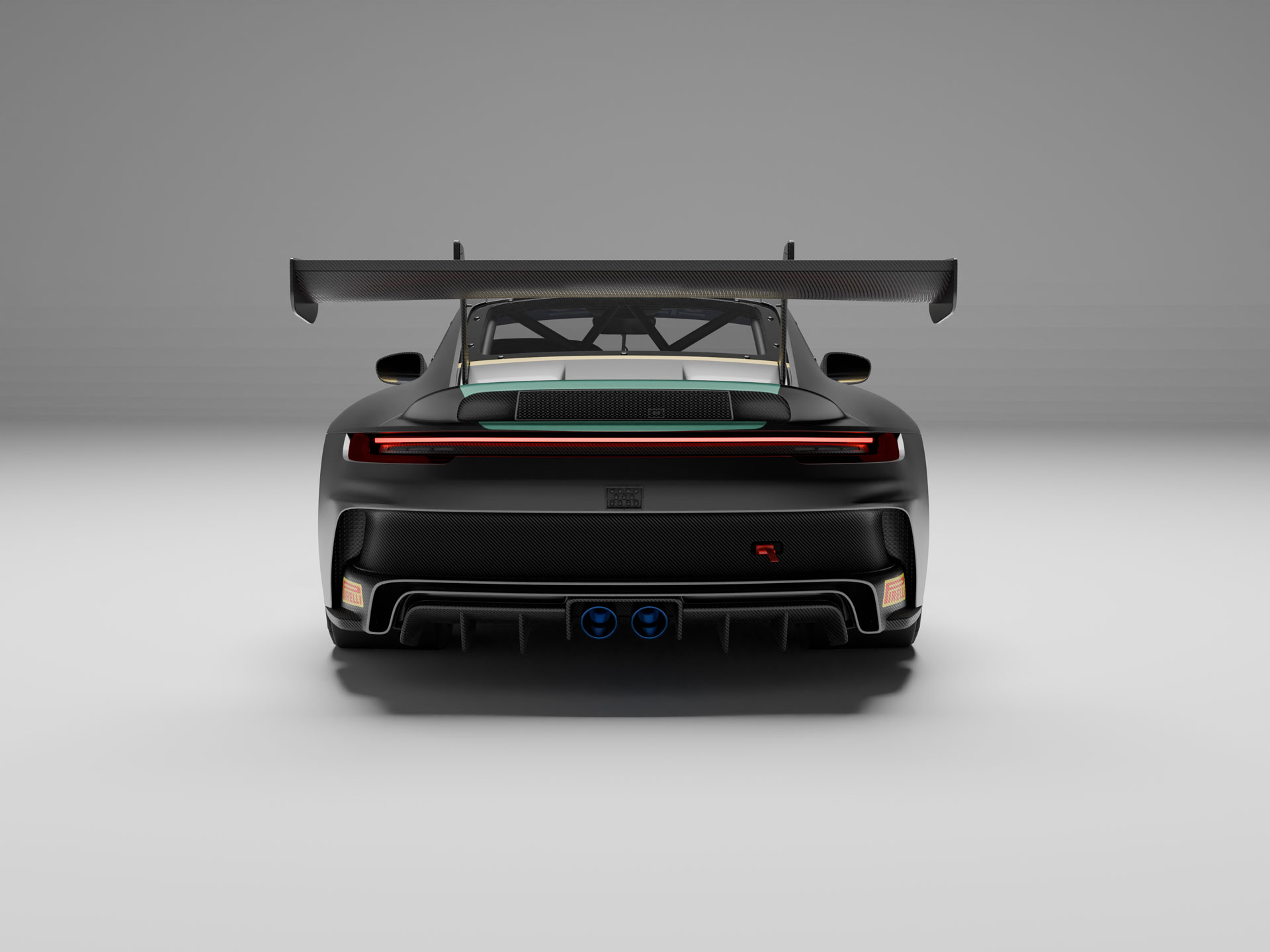 Rear view of a black sports race car with a large rear wing and dual blue exhaust pipes.