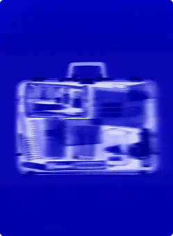 Unscharfes Bild einer blauen Schreibmaschine auf blauem Hintergrund.