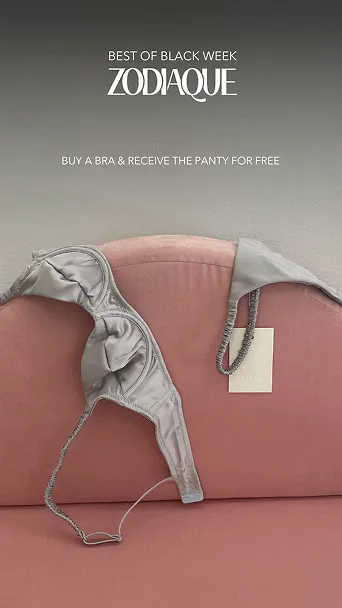 Graues BH-Oberteil auf rosa Samtcouch mit Text: Best of Black Week ZODIAQUE, kaufe einen BH und erhalte die Panty kostenlos.