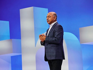 Arvind Krishna on stage at the Think event