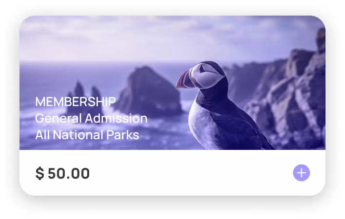 Membership card showing general admission to all national parks priced at $50, with a puffin bird and coastal cliffs in the background.