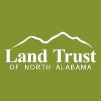 Land Trust of North Alabama logo featuring white stylized mountain peaks above the organization name on a green background.