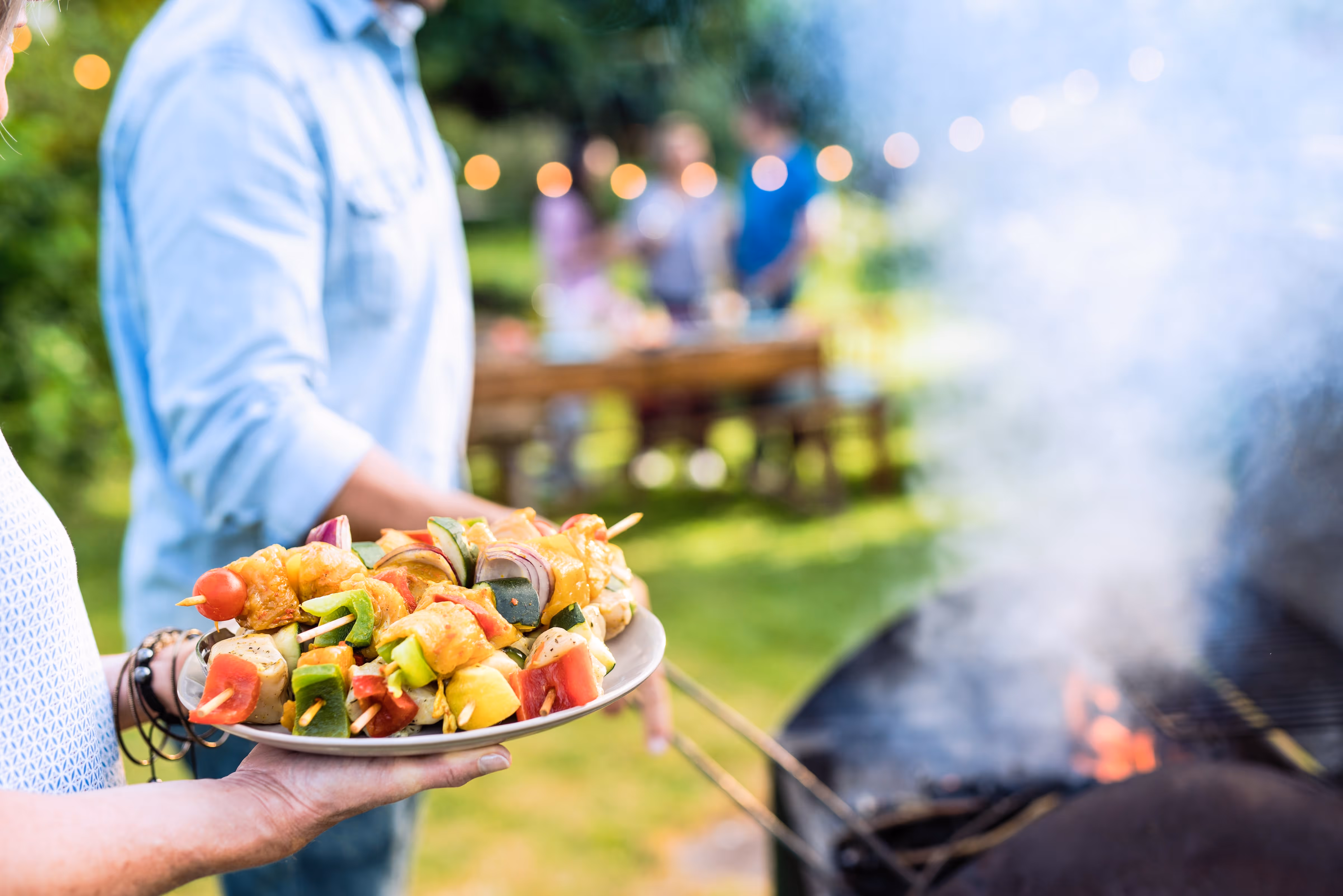 Kabobs on a plate outdoor barbecue stock image
