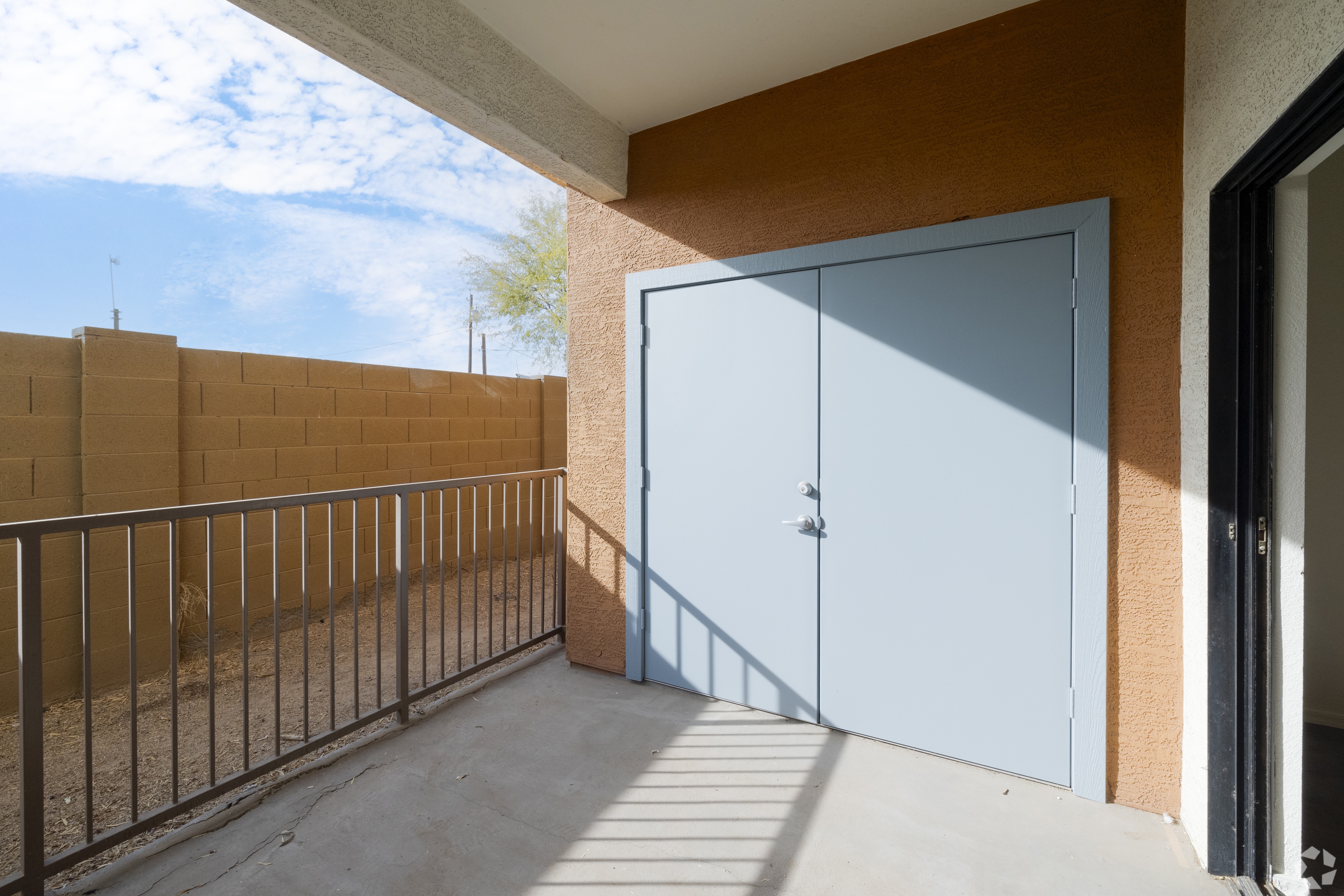 Outdoor patio with storage closet