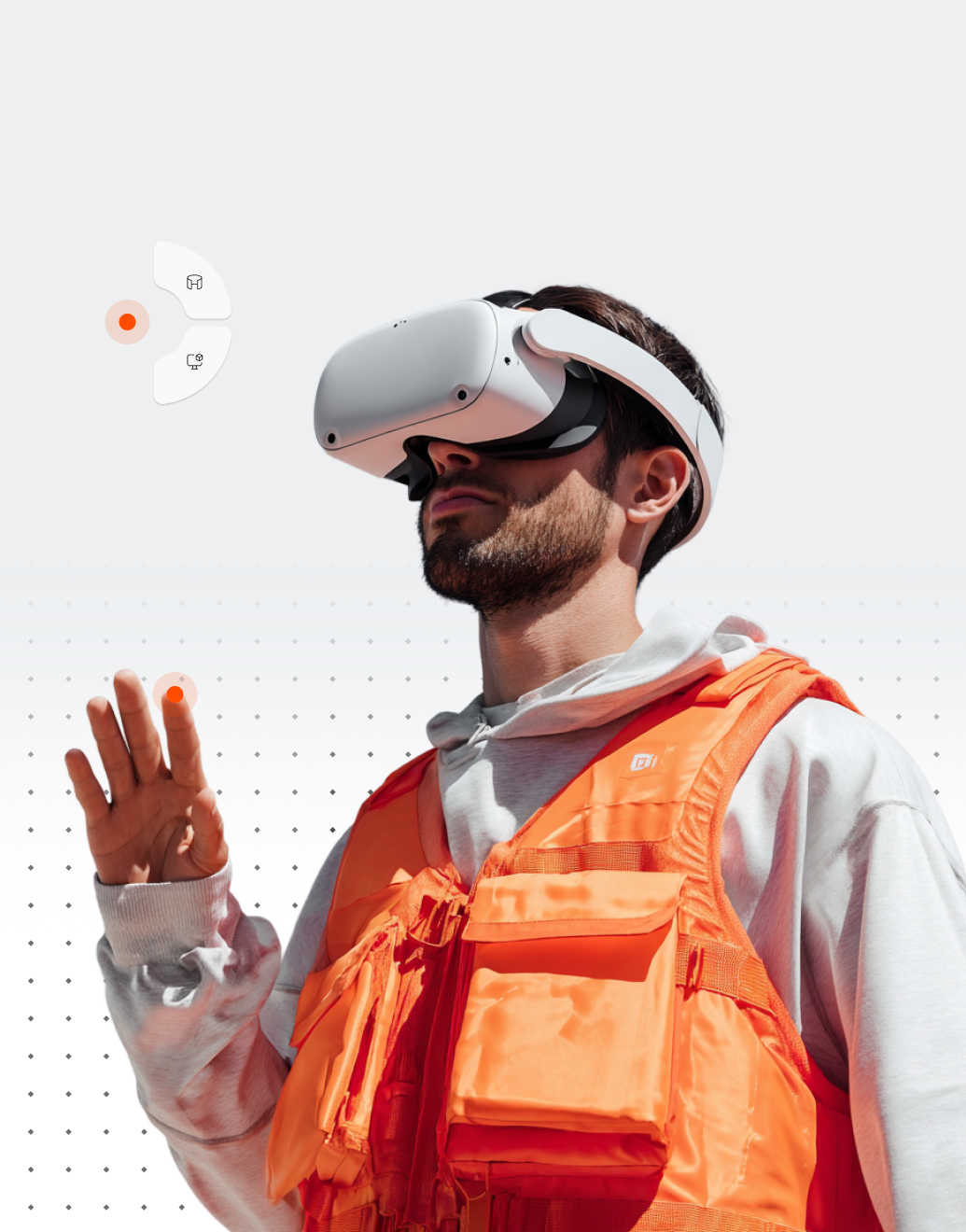 Man wearing a white virtual reality headset and an orange safety vest, raising his hand as if interacting with a virtual environment.