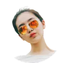 Young woman wearing reflective orange sunglasses with her hair pulled back and a neutral expression.