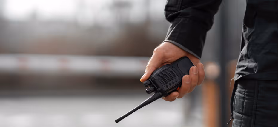 worker holding a talkie