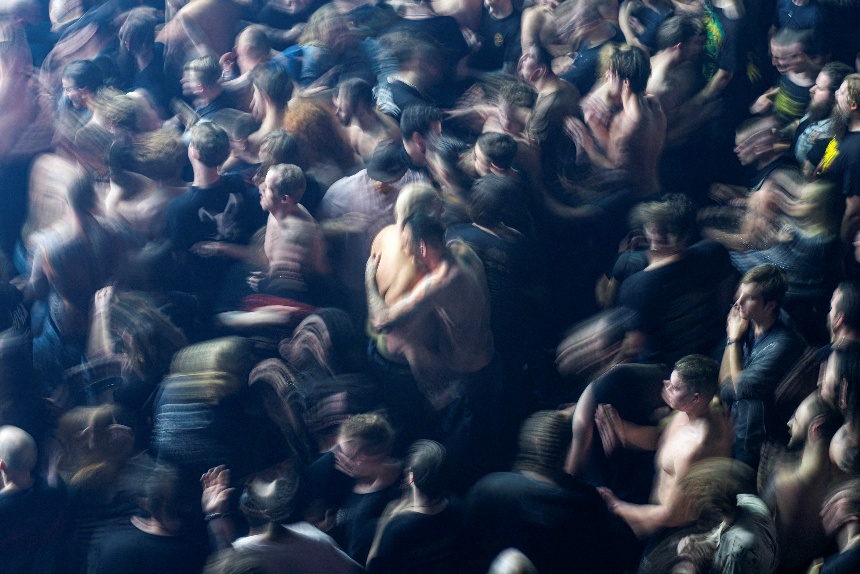 A crown of people at a concert or show shot from a high vantage point