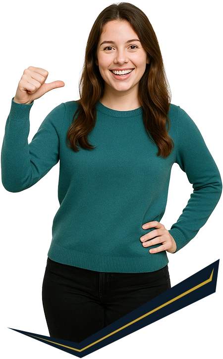 Smiling woman in teal sweater pointing thumb towards herself with one hand on hip.