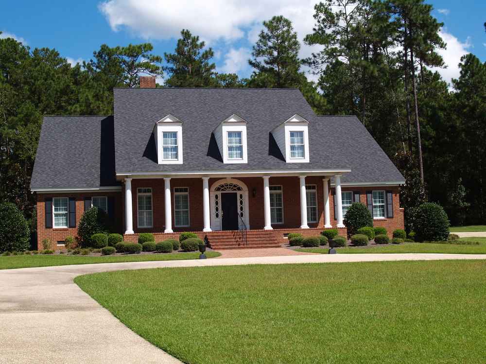Close-up view of asphalt shingle roofing installation on a residential home