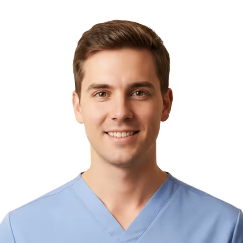 Smiling young male medical professional wearing light blue scrubs against a transparent background.