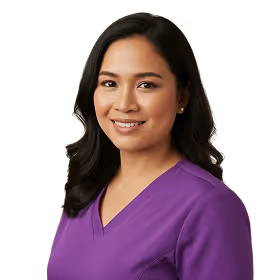 Smiling woman with long dark hair wearing a purple V-neck top against a transparent background.