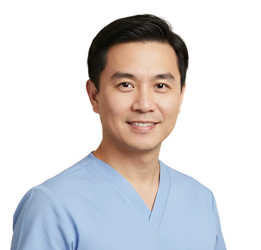 Smiling Asian male healthcare professional wearing light blue scrubs against a white background.