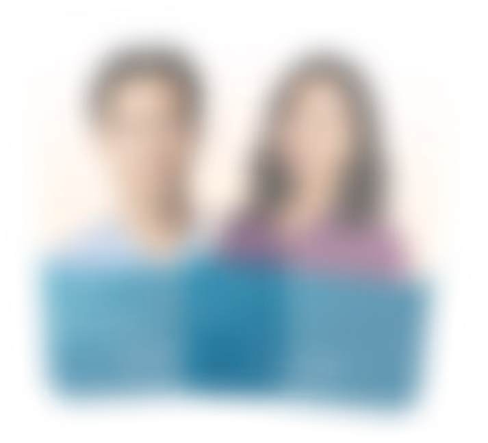 Blurred image of a man and a woman standing side by side on a light background.