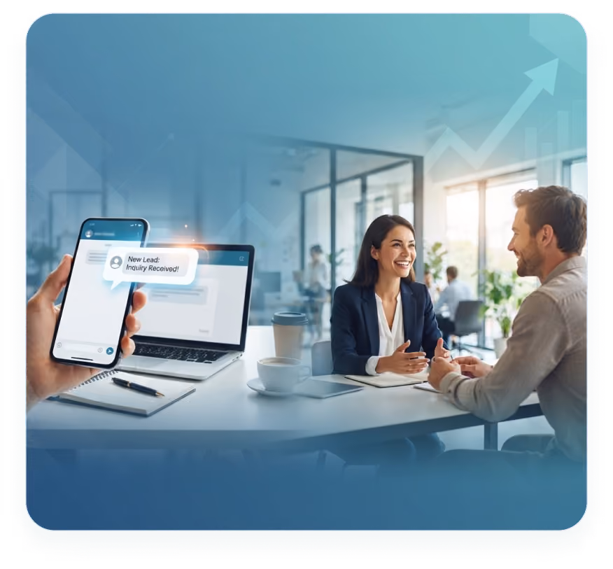 Businesswoman and man smiling during a meeting with a phone showing a new lead inquiry message.
