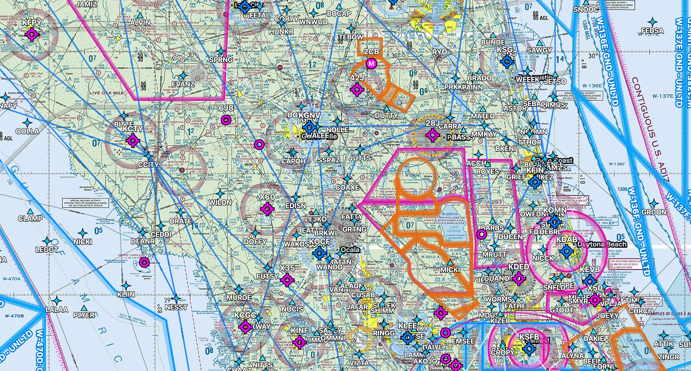Detailed aviation sectional chart showing airspace boundaries, navigation aids, airports, and geographic locations in a region with blue and magenta markings.