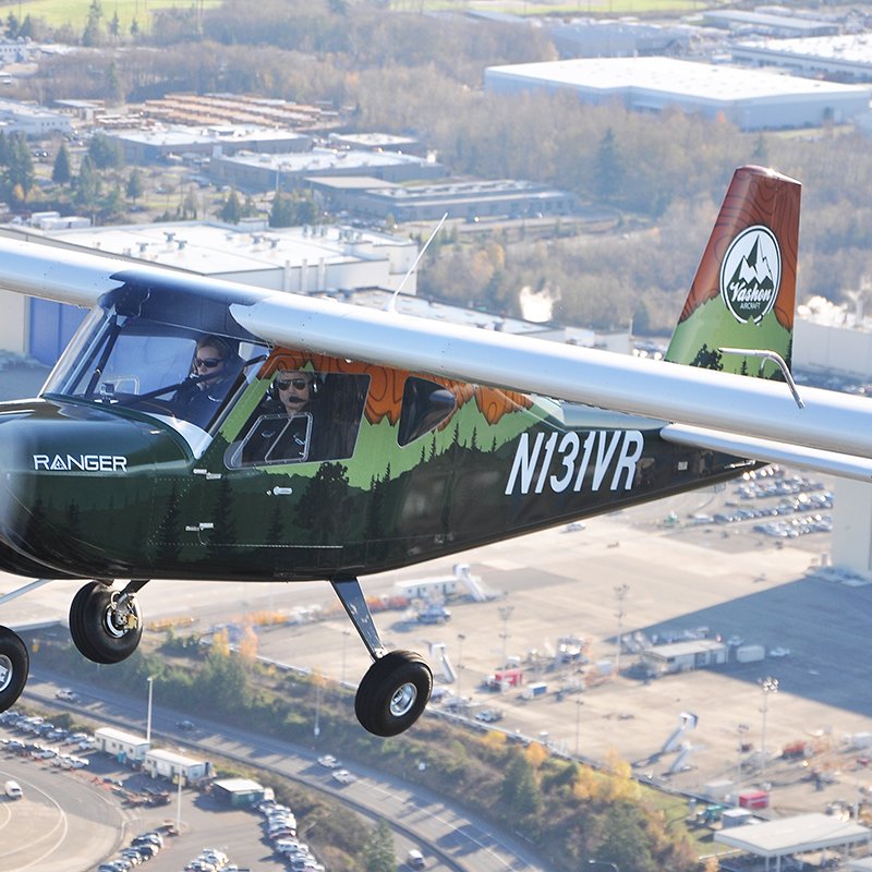 Close air-to-air view of a Vashon Ranger R7 in flight.