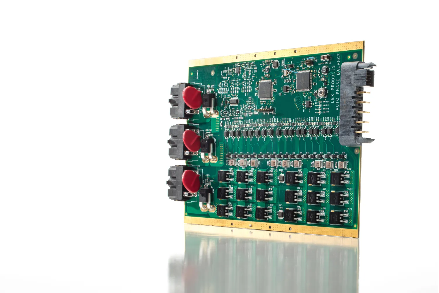 Green printed circuit board with black and red electronic components and connectors, labeled 'LEX PRODUCTS AUTO PHASE BALANCE'.
