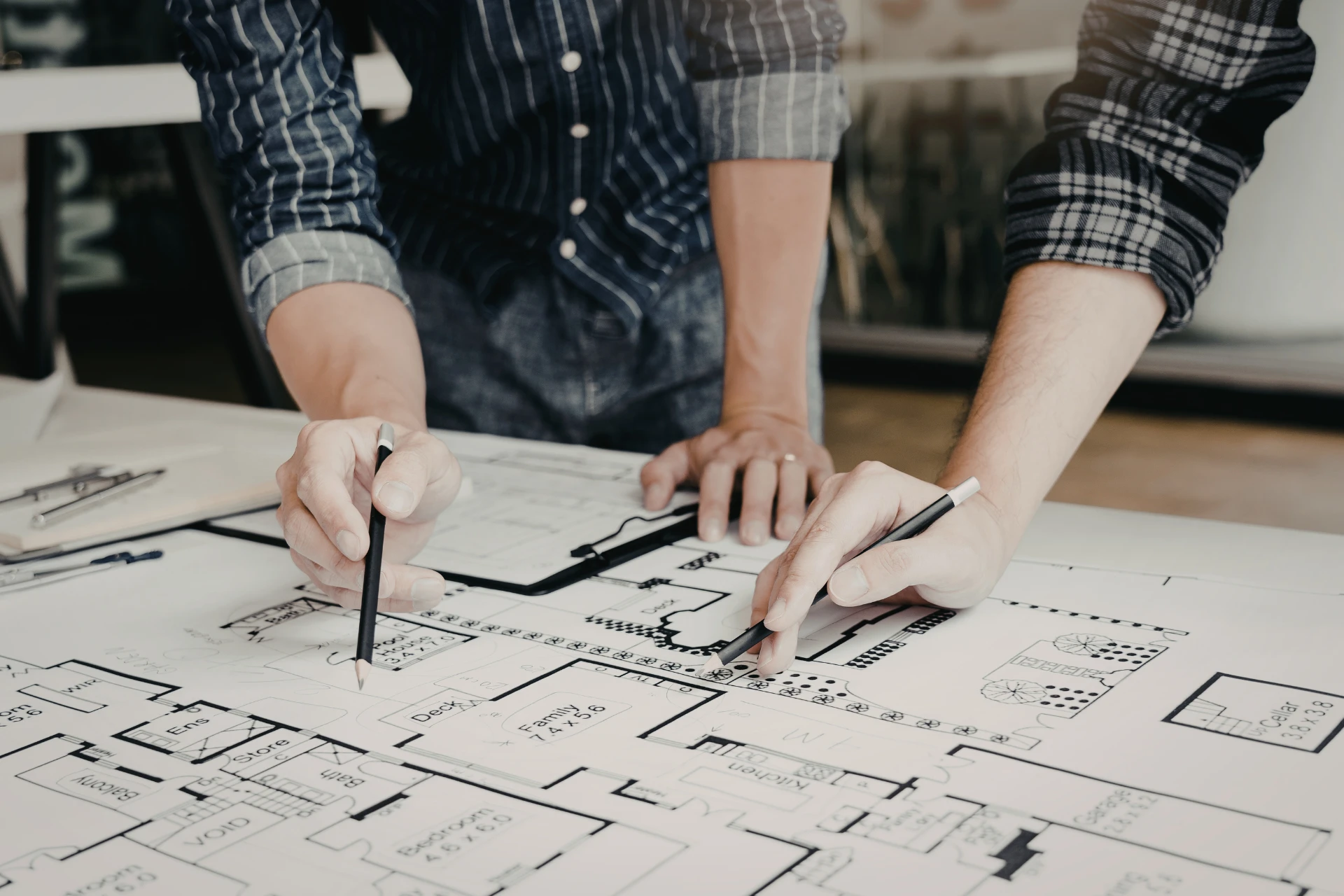 Architects creating an office floor plan
