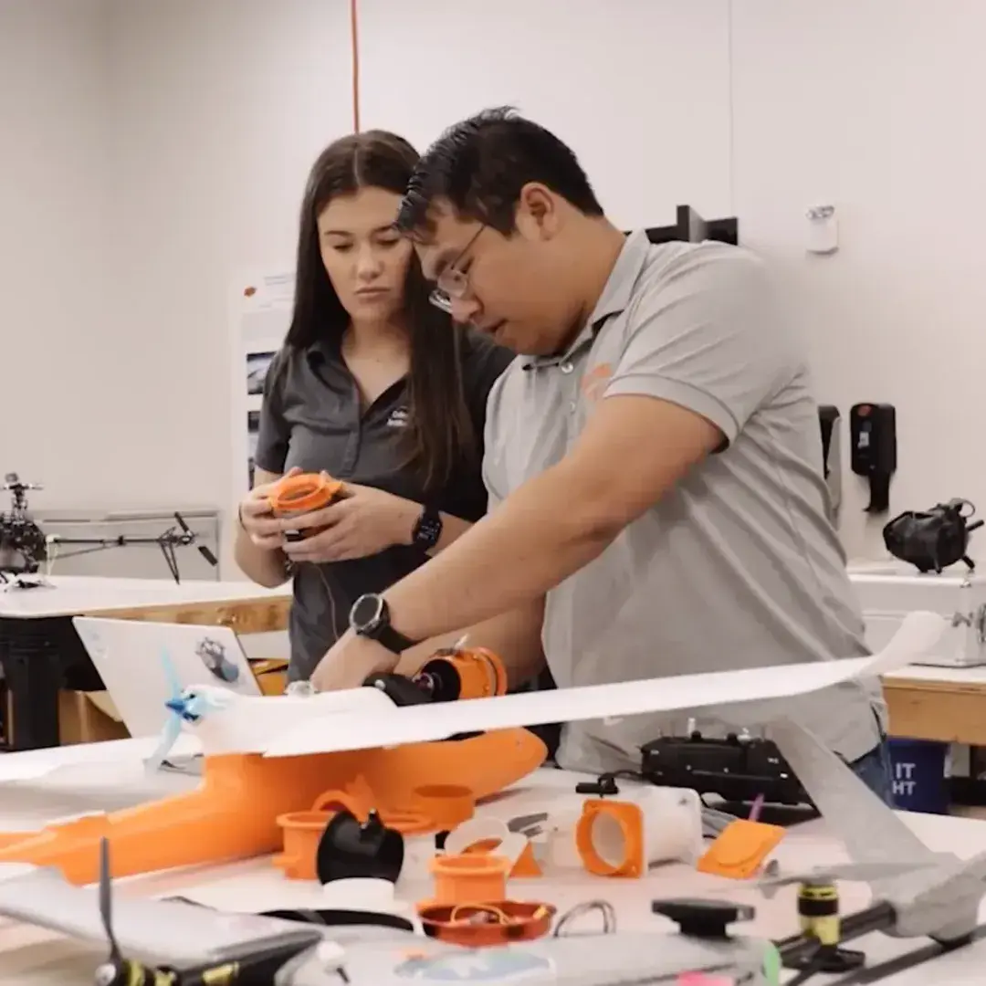 Students work on a drone at the LaunchPad Center for Advanced Air Mobility