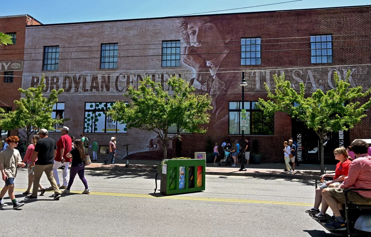 The outside of the Bob Dylan Center, featuring a mural of Dylan himself.