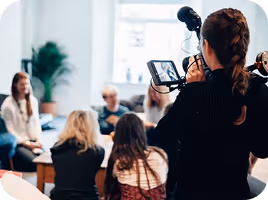 Creative professionals working on design, media, and visual content projects