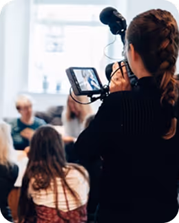 Creative professionals working on design, media, and visual content projects