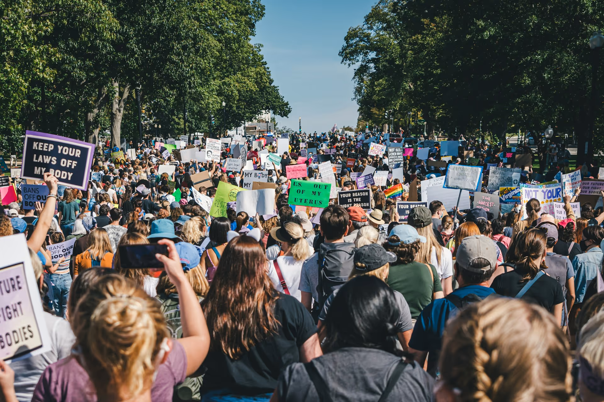 Group of people attending a large outdoor event or festival