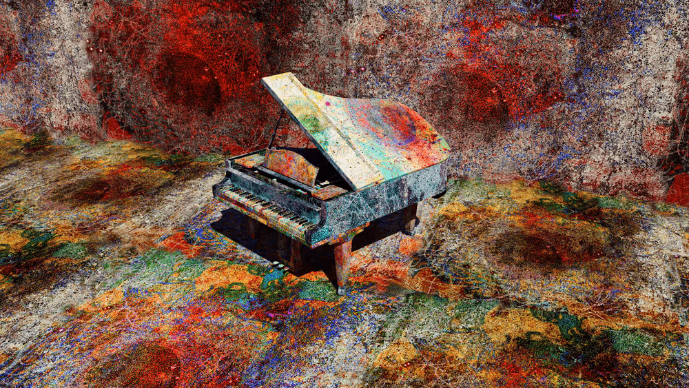 A piano on a colorful surfaceDescription automatically generated