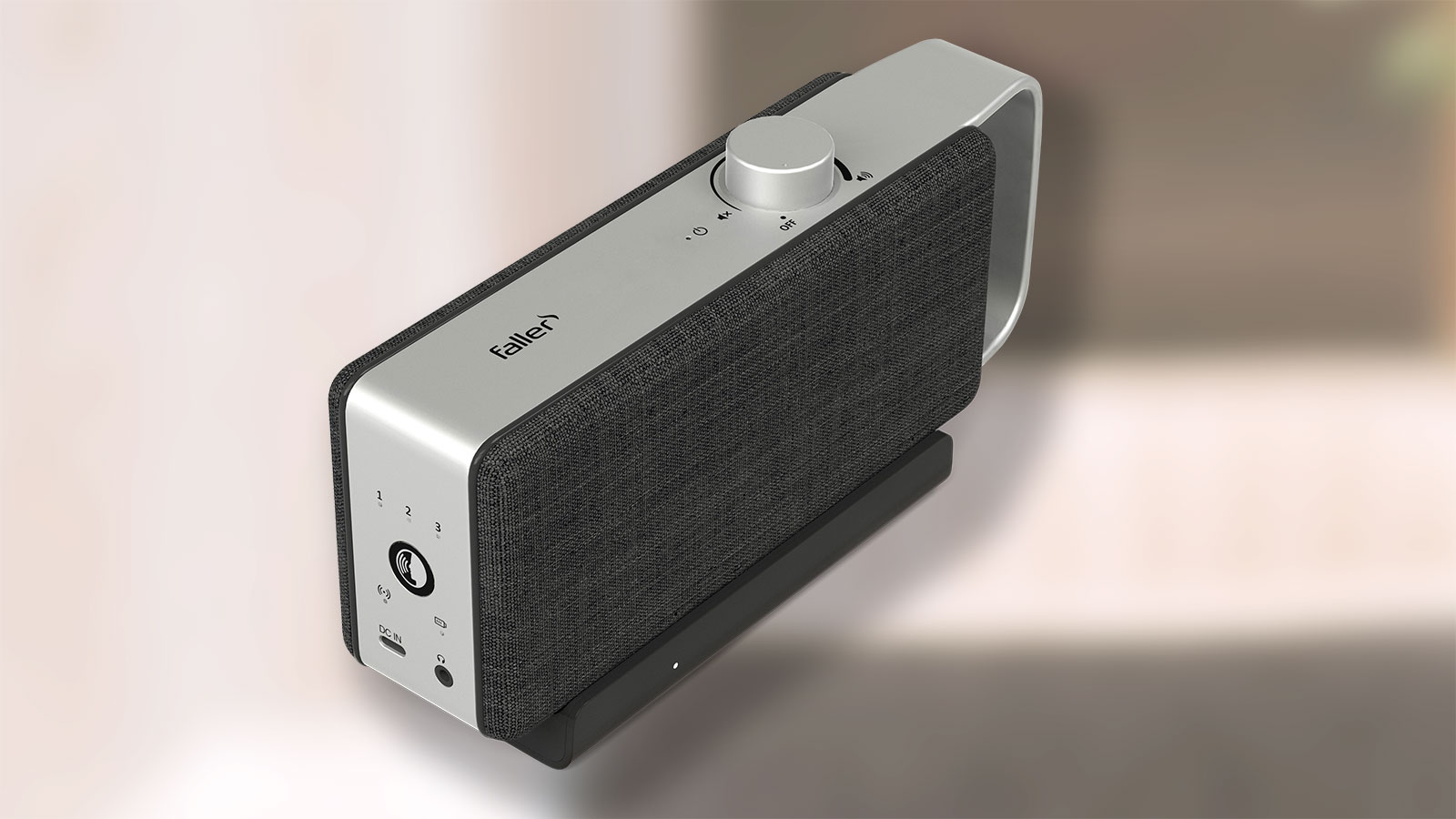 Tragbarer Faller Lautsprecher in Silber mit Stofffront in Nahaufnahme