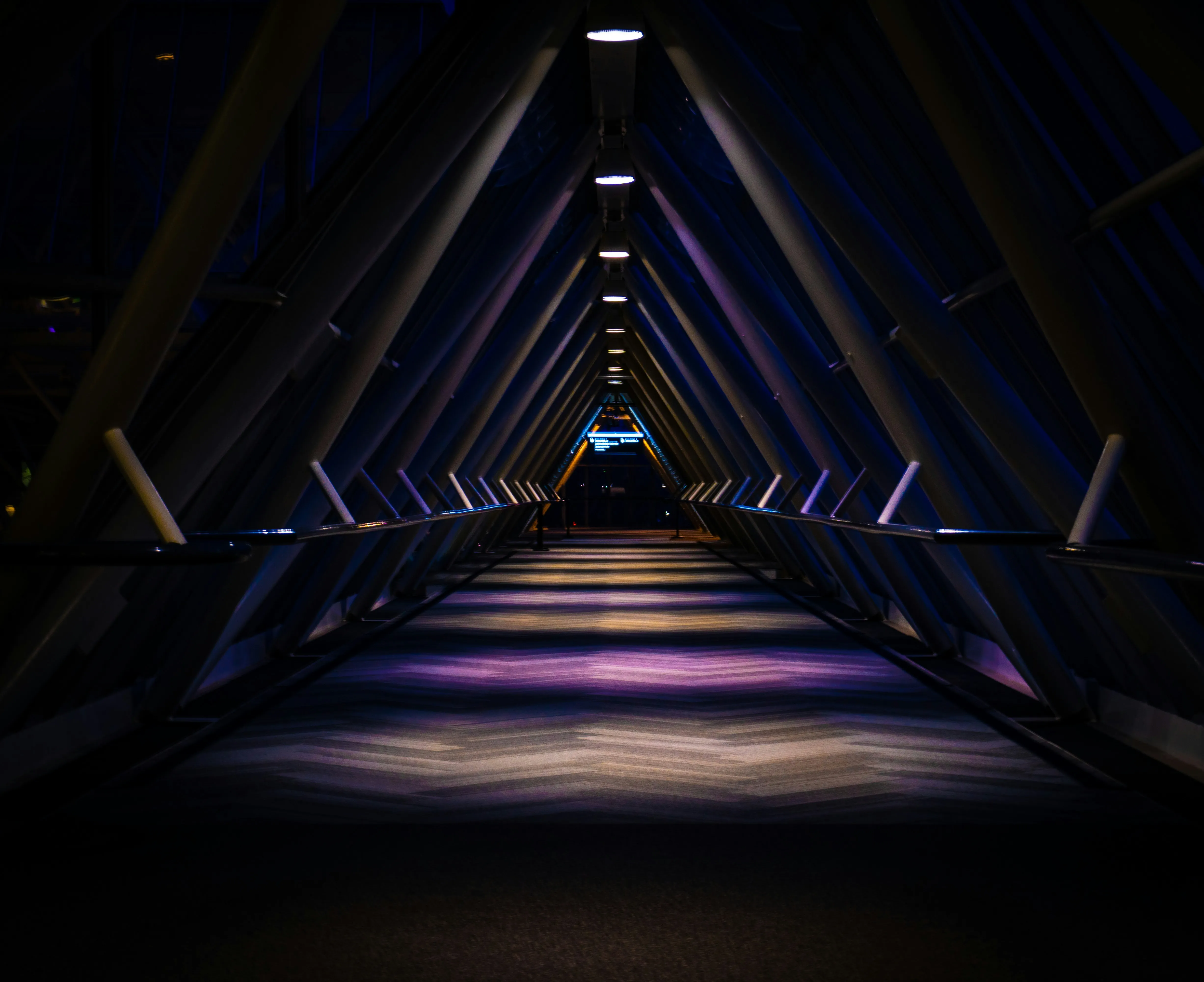 Image of long hallway with machines on each side