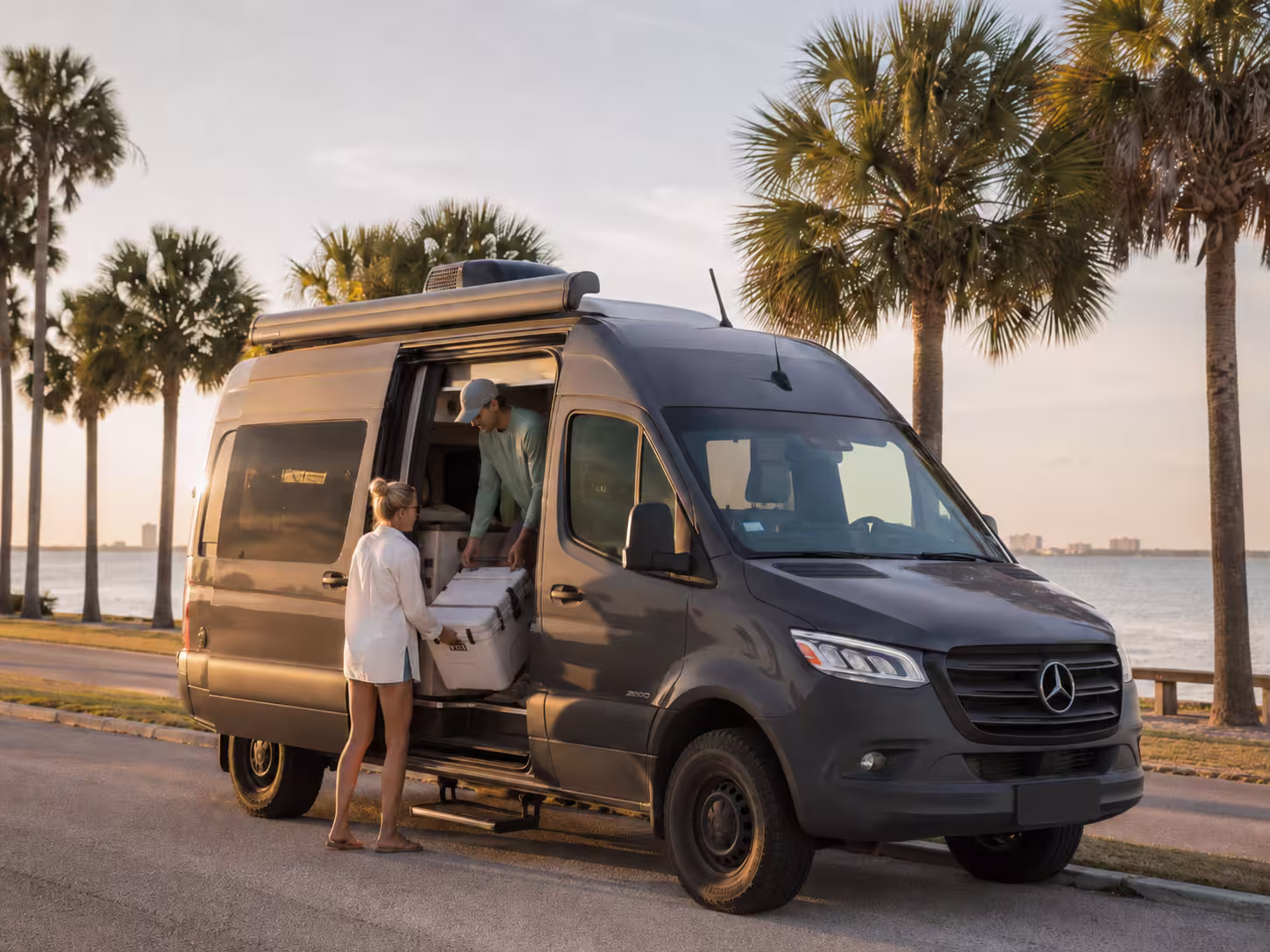 Class B camper van parked near a Tampa Bay causeway