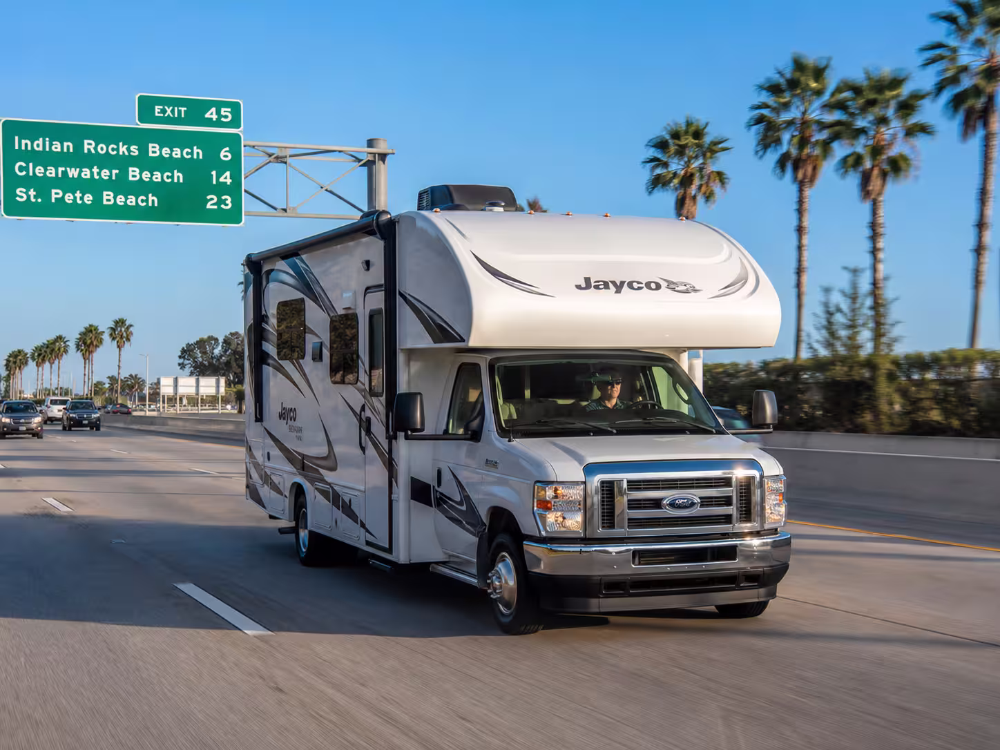 Class C motorhome driving toward the Gulf near Tampa