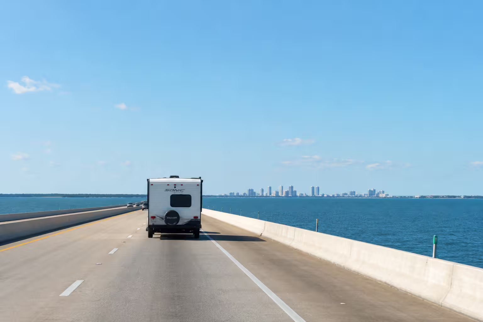 Camper crossing a Tampa Bay causeway toward the Gulf beaches