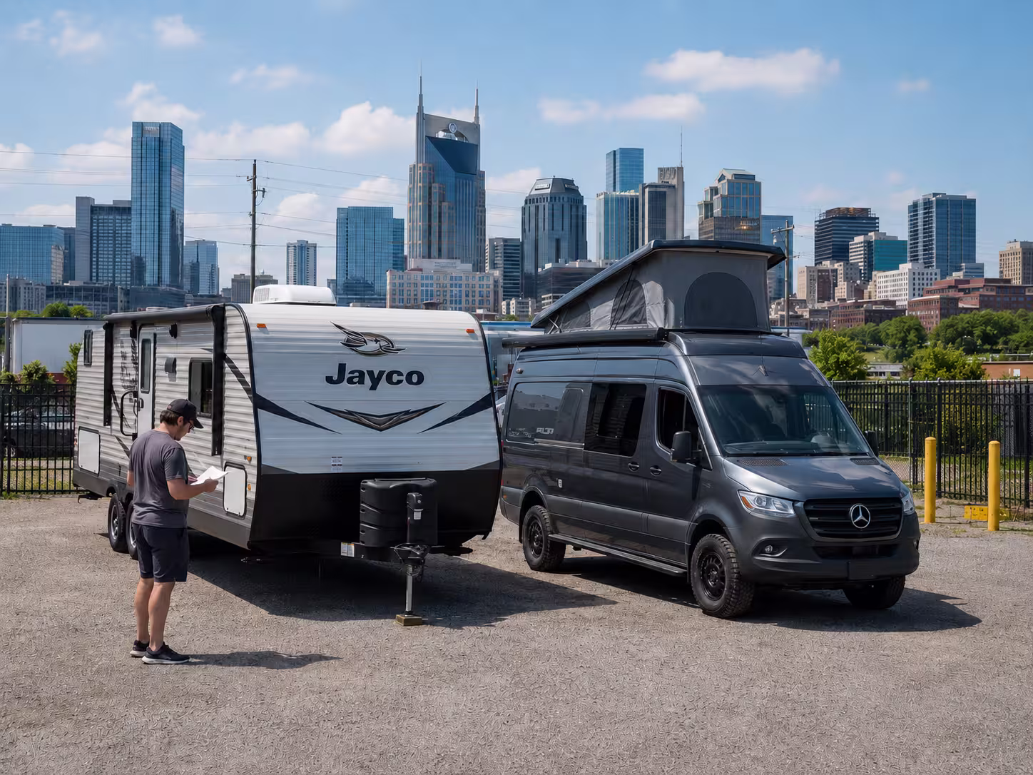 Camper van and travel trailer at a Nashville RV pickup lot