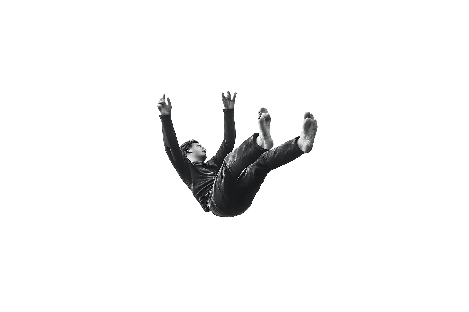 Black-and-white image of a man falling backward with arms raised and bare feet visible.