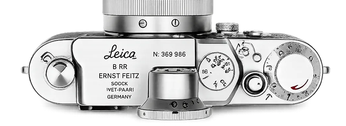 Top view of a vintage Leica Ernst Feitz camera with dials and serial number 369986.