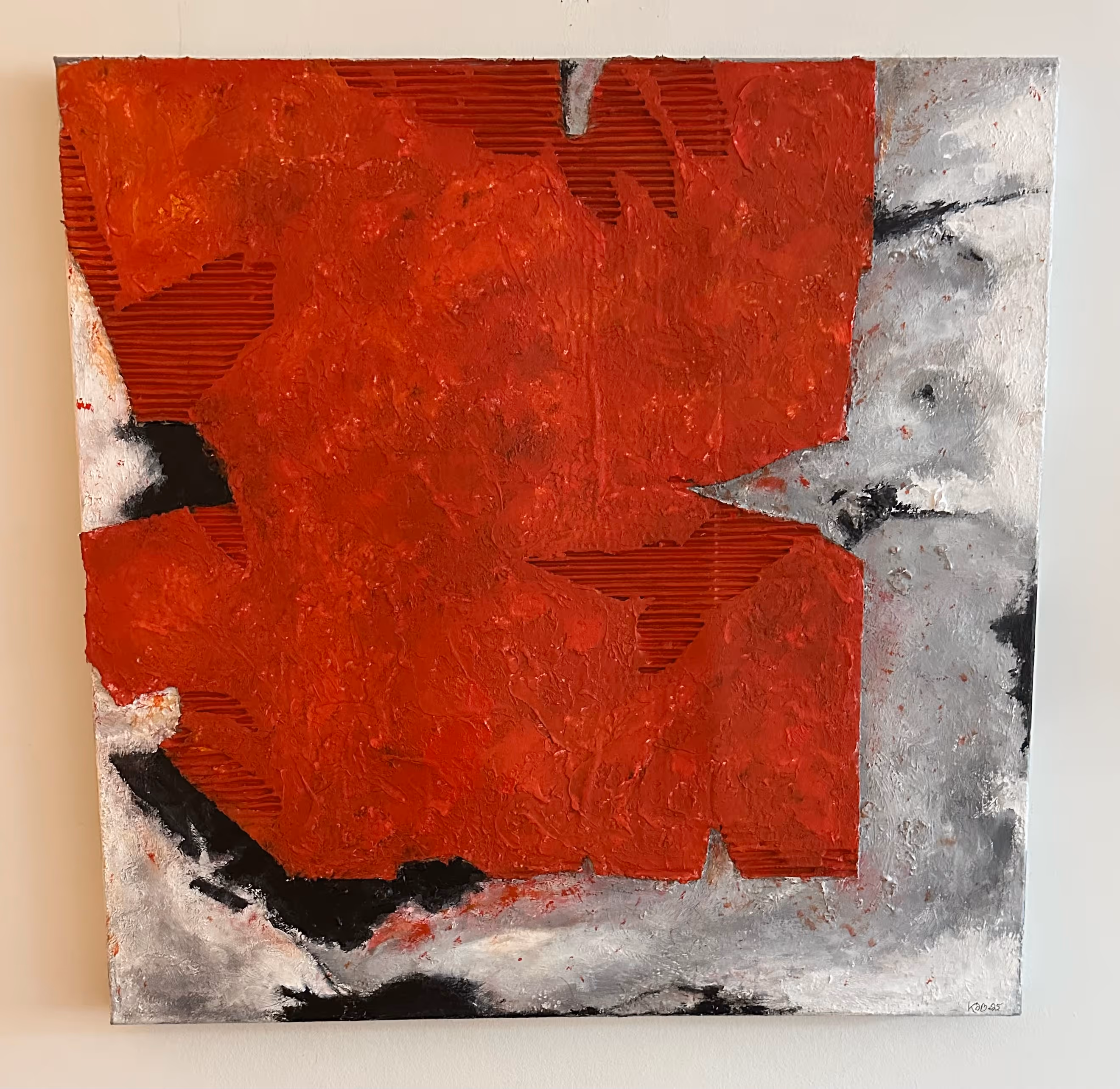 Abstract painting with textured red shapes over a gray and black background.
