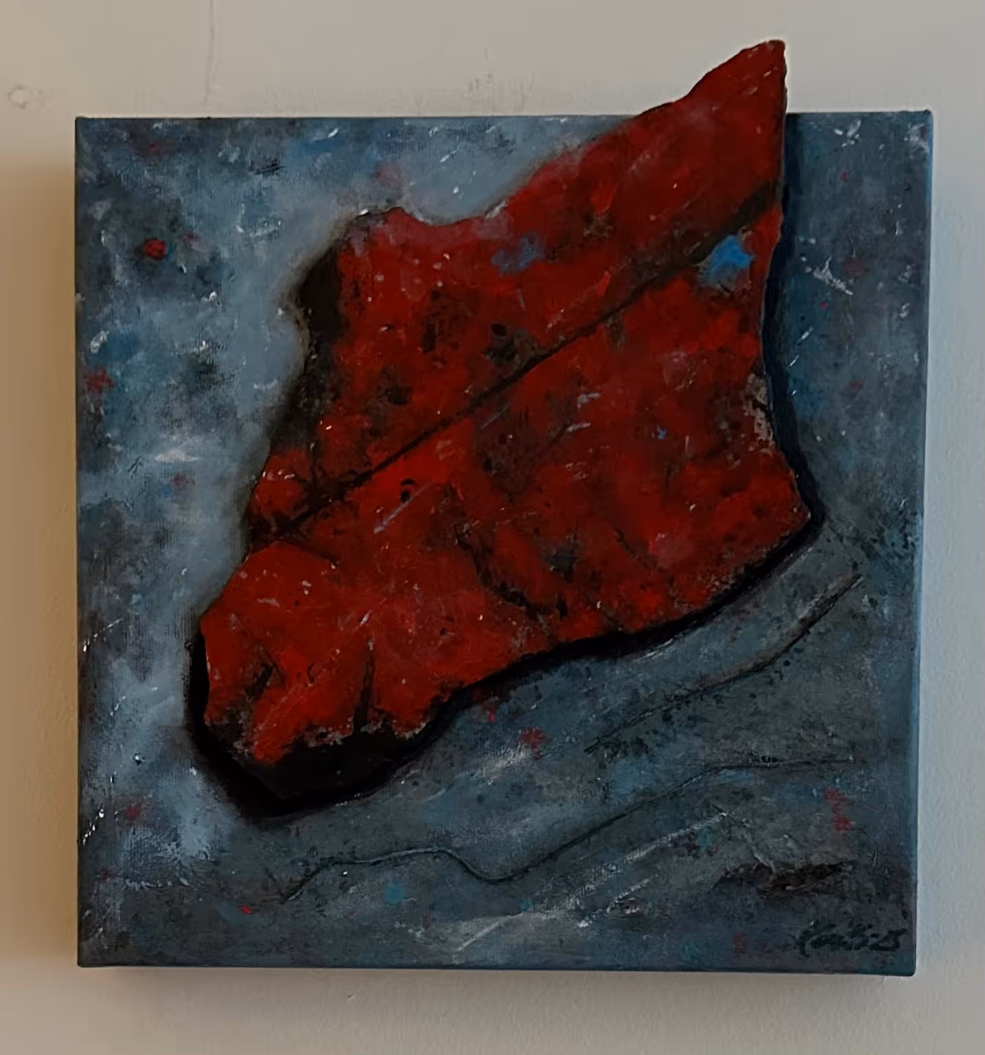 Abstract painting of a large red leaf with black veins on a textured blue-gray background.