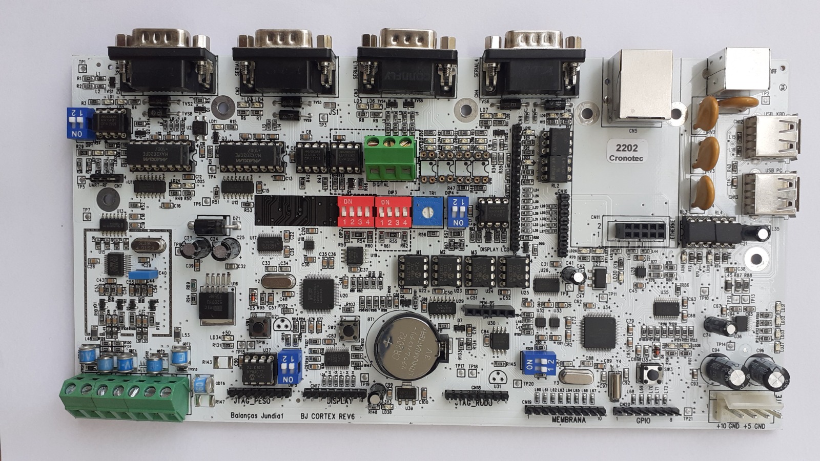 Futuristic PCB circuit board with glowing cyan blue lights