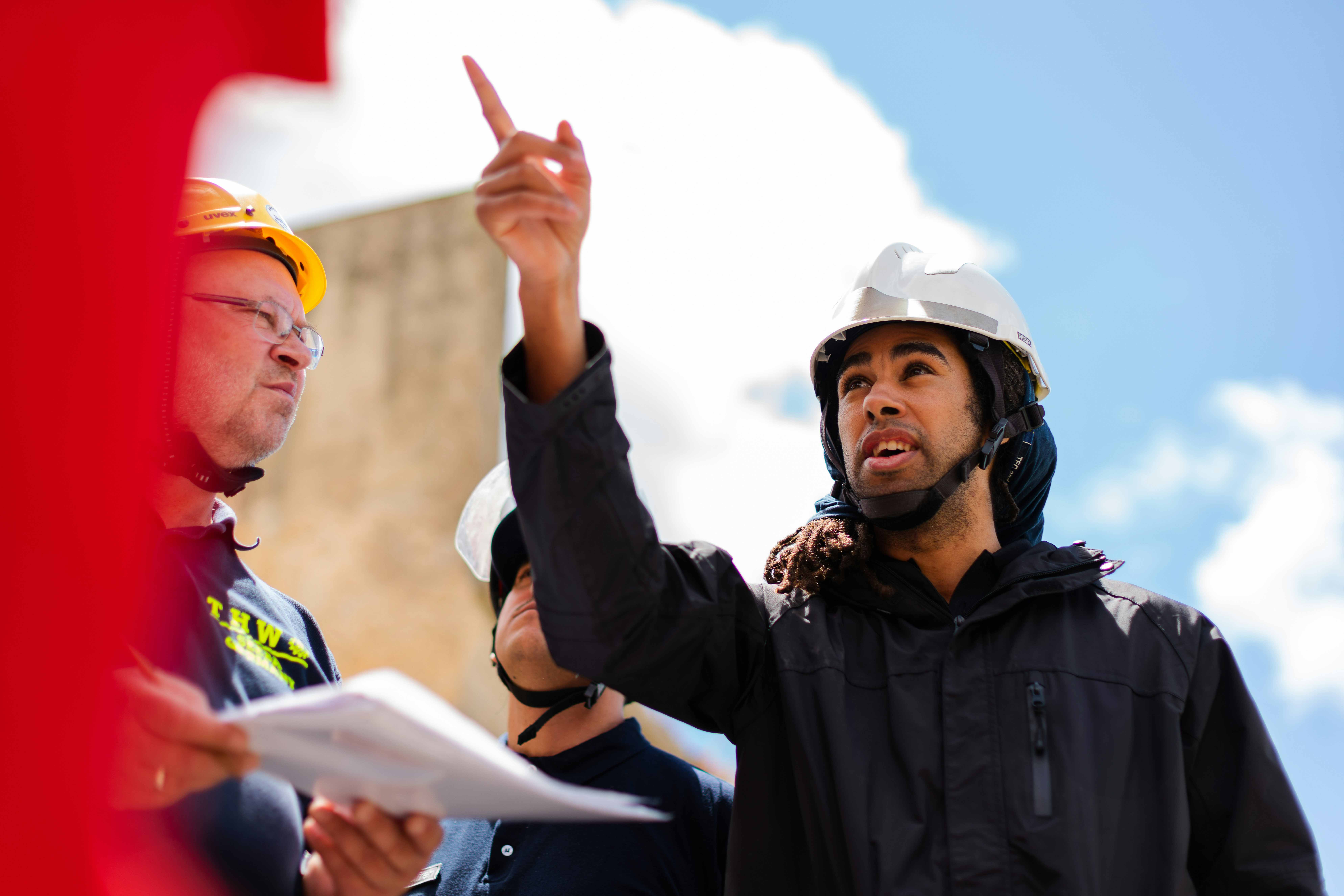 [background image] image of construction team meeting in a modern office