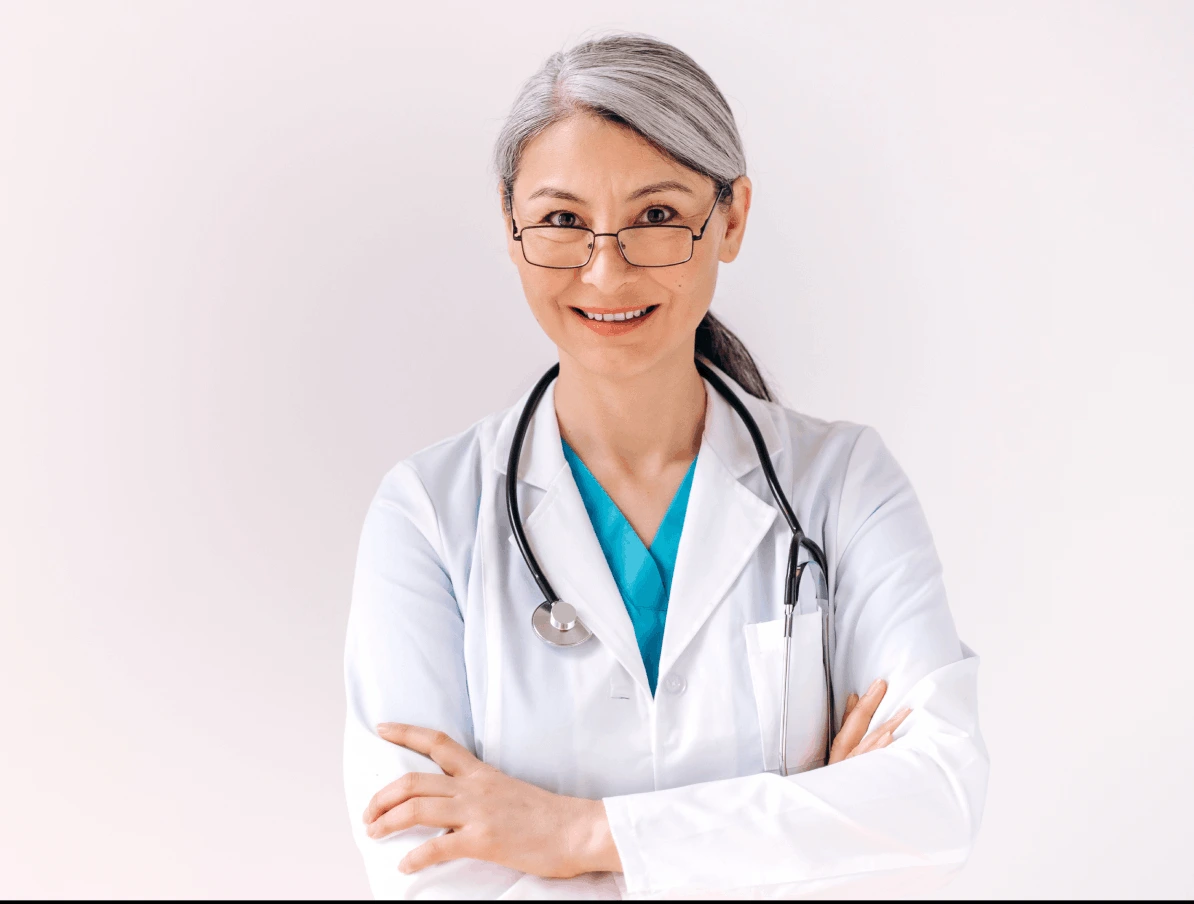 an elderly woman - a doctor, dressed in an apron