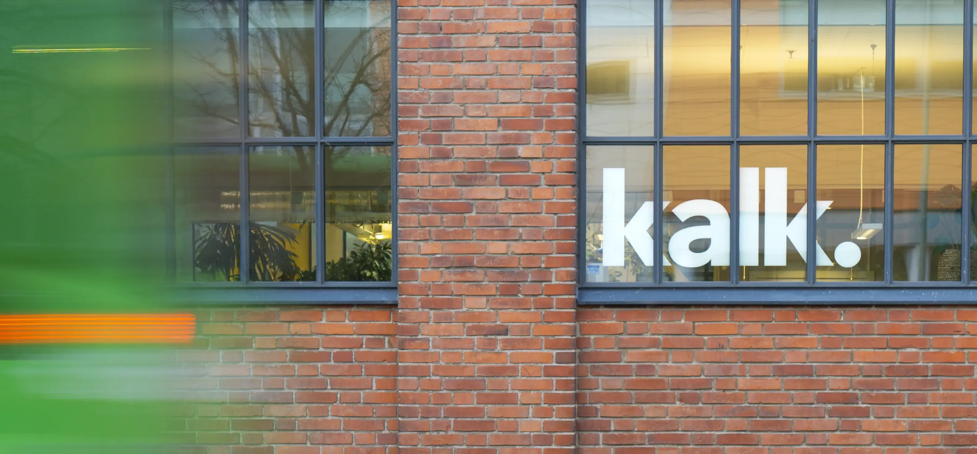 Exterior view of the studio building in daylight, showing the company’s office location.